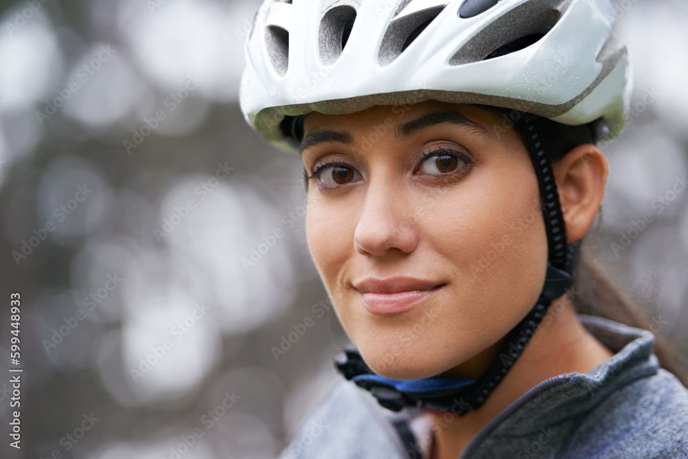 Lets get serious about cycling. an attractive young woman cycling outdoors. Lets get serious about cycling. an attractive young woman cycling outdoors.