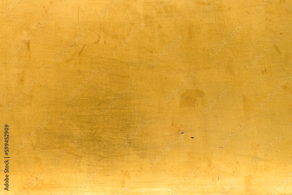 Artificial Gold background and texture on cement make from color paint