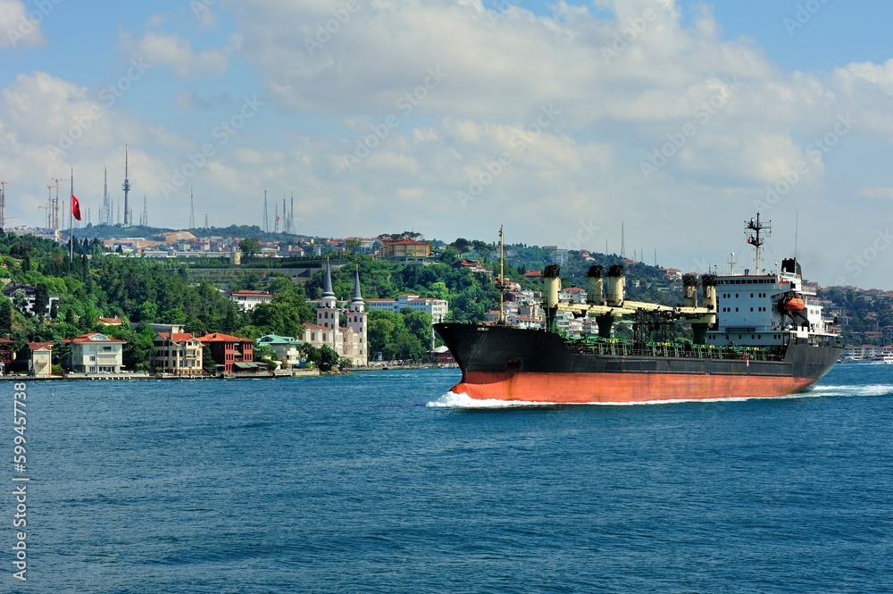 Large bulk carrier sailing on the Bosphorus Strait in Istanbul, Turkey