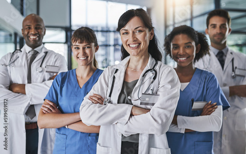 Leading the way to great health. Portrait of a team of confident doctors standing together in a hospital.