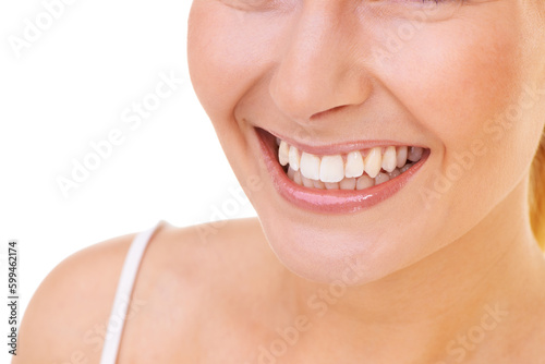 Bright and beautiful smile. Close up of a beautiful womans smile.