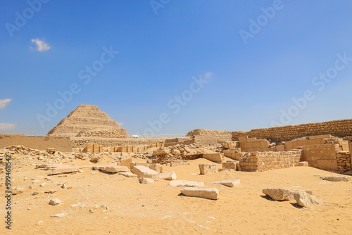 Tablou pe pânză The ancient Saqqara tombs with the Step pyramid of Saqqara in the background,  E