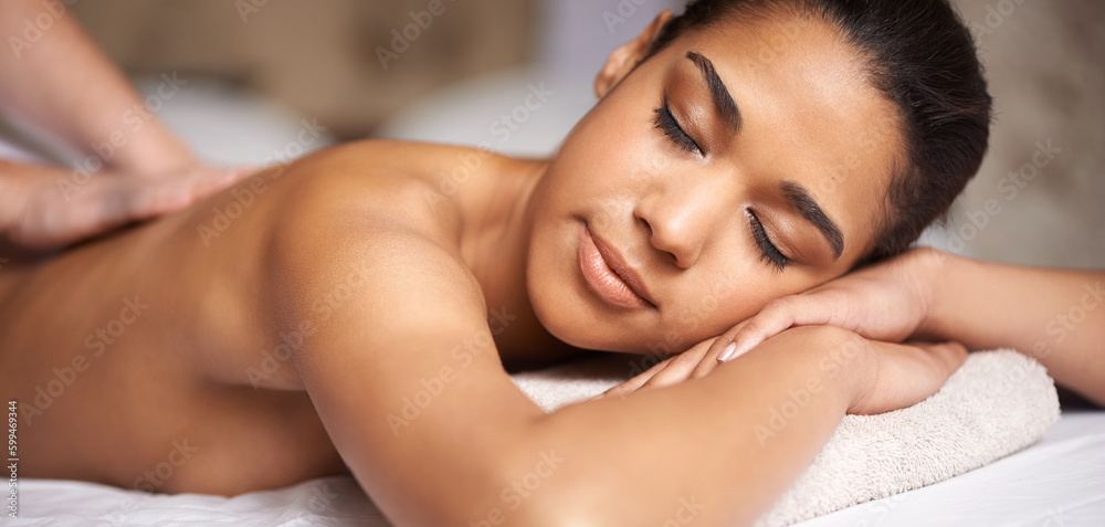 I think Im in heaven...a young woman enjoying a back massage at a spa. I think Im in heaven...a young woman enjoying a back massage at a spa.