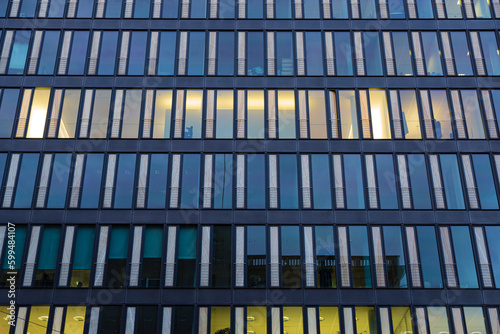 Reflections and light on windows of glass and metal building