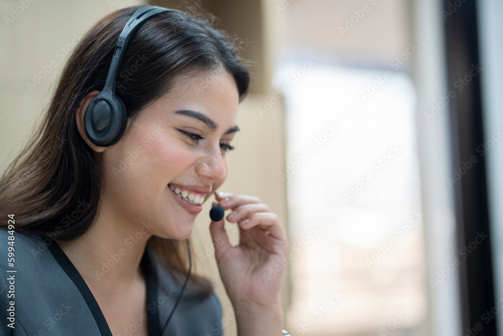 Young woman operator agent with headsets working in a call centre. Young woman operator agent with headsets working in a call centre.