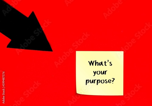 Black arrow on red background with handwritten text - What’s your purpose? - to discover purpose in life,what is really matter and make life meaningful