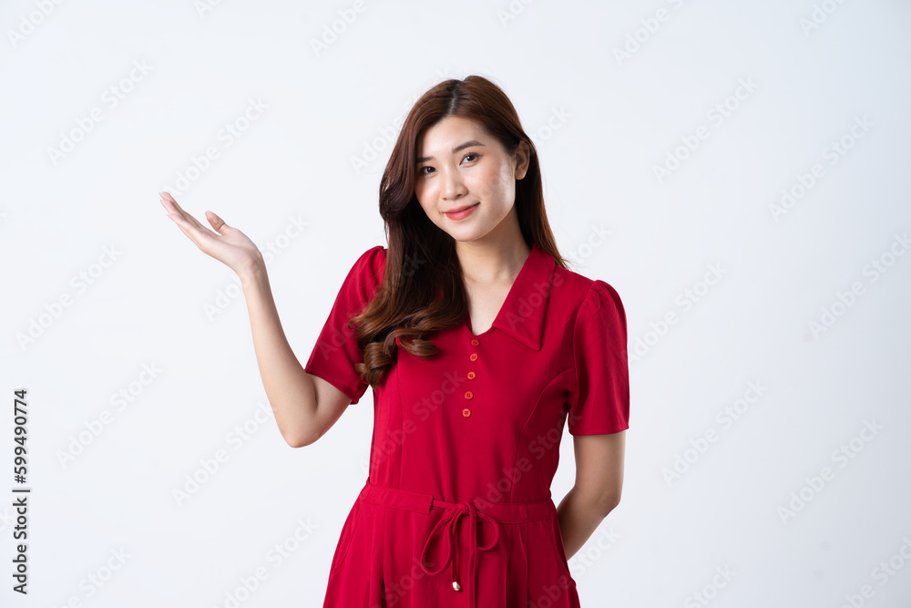 Portrait of a beautiful, charming lady wearing a red dress on a white background Portrait of a beautiful, charming lady wearing a red dress on a white background