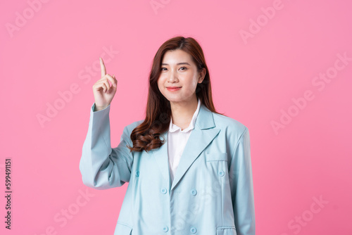 Asian businesswoman portrait on pink background