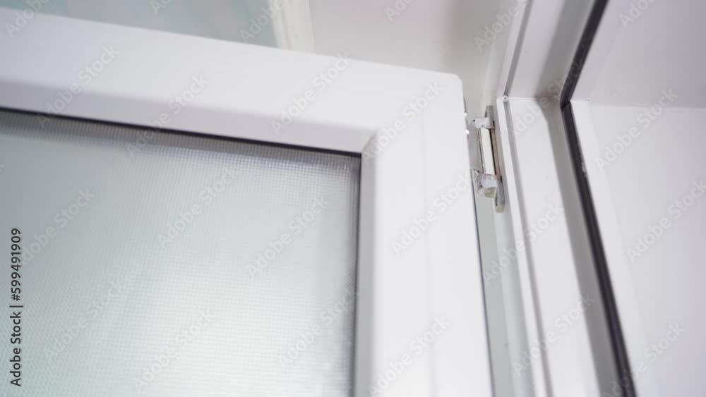 Opening and closing a plastic window. Window Mounting Hinge