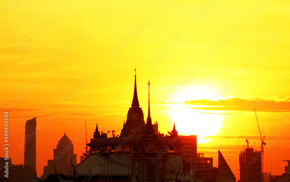Silhouette of the Golden Mount (Chedi Phu Khao Thong) of Wat Saket Temple at Dawn, the Iconic Landmark of Bangkok, Thailand
