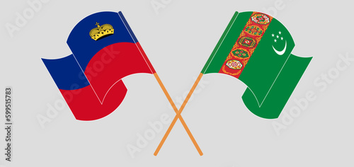 Crossed and waving flags of Liechtenstein and Turkmenistan