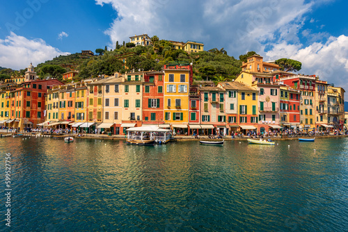 Colorful houses in the port of Portofino village, luxury tourist resort in Genoa Province, Liguria, Italy, Europe. Mediterranean sea (Ligurian sea).