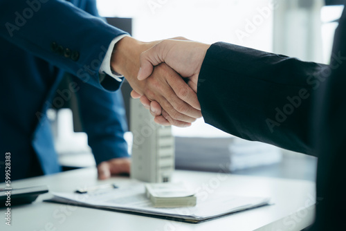 shake hands at business meeting, office negotiations. Making deal sign, conclude contract, reach agreement, formal greeting, strike bargain. Successful negotiations, insurance concept.