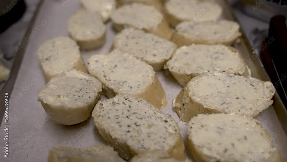 Garlic Butter Spread on Bread before going in the Oven Garlic Butter Spread on Bread before going in the Oven
