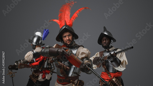 Shot of medieval spanish soldiers with flintlock guns and cuirasses.