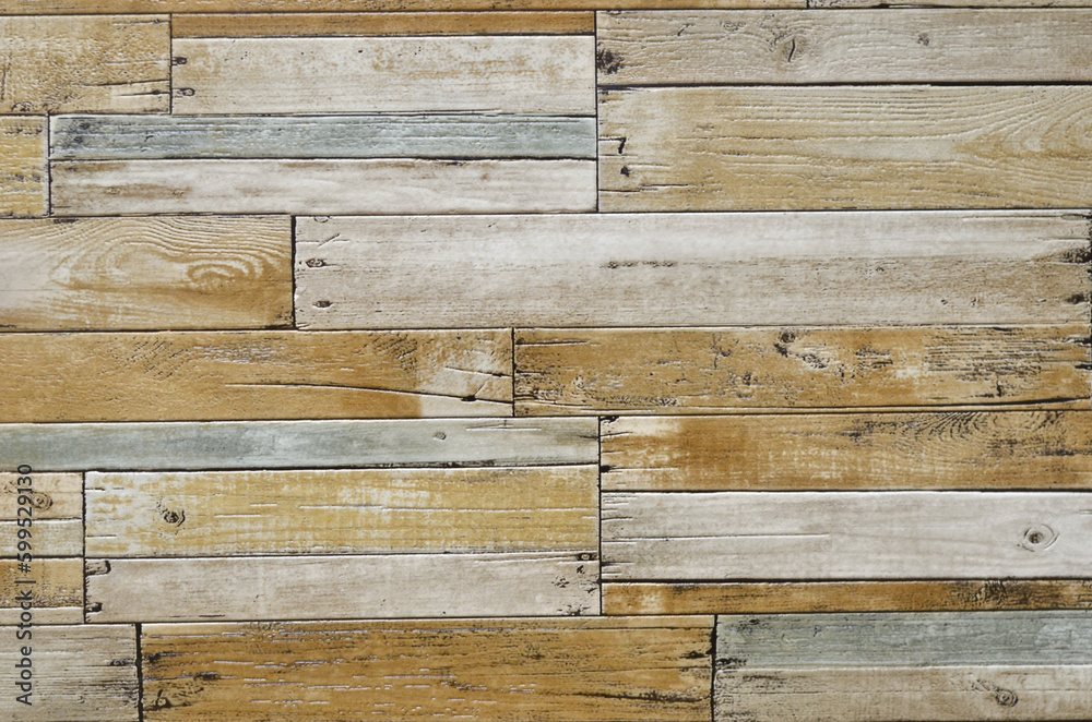 Naklejka premium background from short wooden boards in light yellow-gray-brown tones. old wood background.