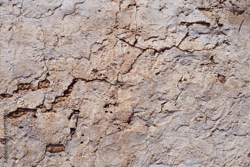 Textura pared antigua agrietada, recubierta con cal y cemento