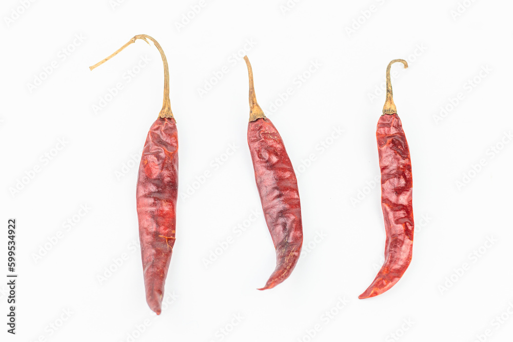 Dried red chili on white background. Clipping path included. Dried red chili on white background. Clipping path included.