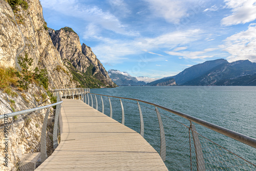  Ciclopista del Garda  - Bicycle road and foot path over Garda lake with beautiful landscape scenery at Limone Sul Garda - travel destination in Brescia  Italy