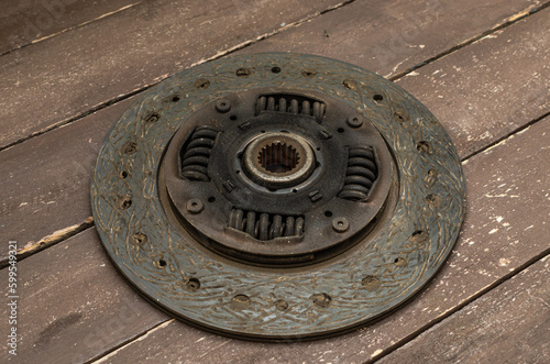 Disassembled clutch disc of a car in a car service repair shop