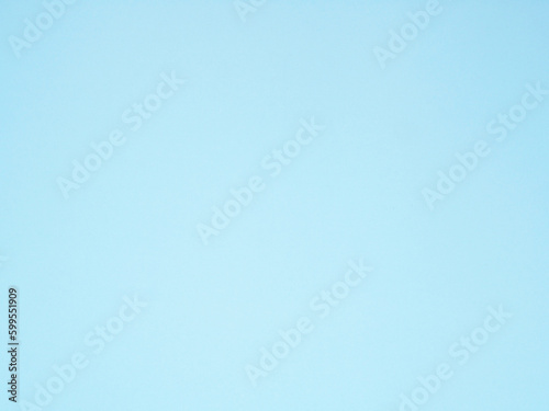 Empty light blue colored background texture. Blank blue paper surface space for your image, text, art, design, and composition for banner, wallpaper, backdrop.