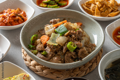 Korean food dish Set Menu of Napa Wraps with Pork Set Menu with Braised Fish Soft Tofu Stew Stir-fried chicken in earthen pot Set Menu with Marinated Beef Ribs