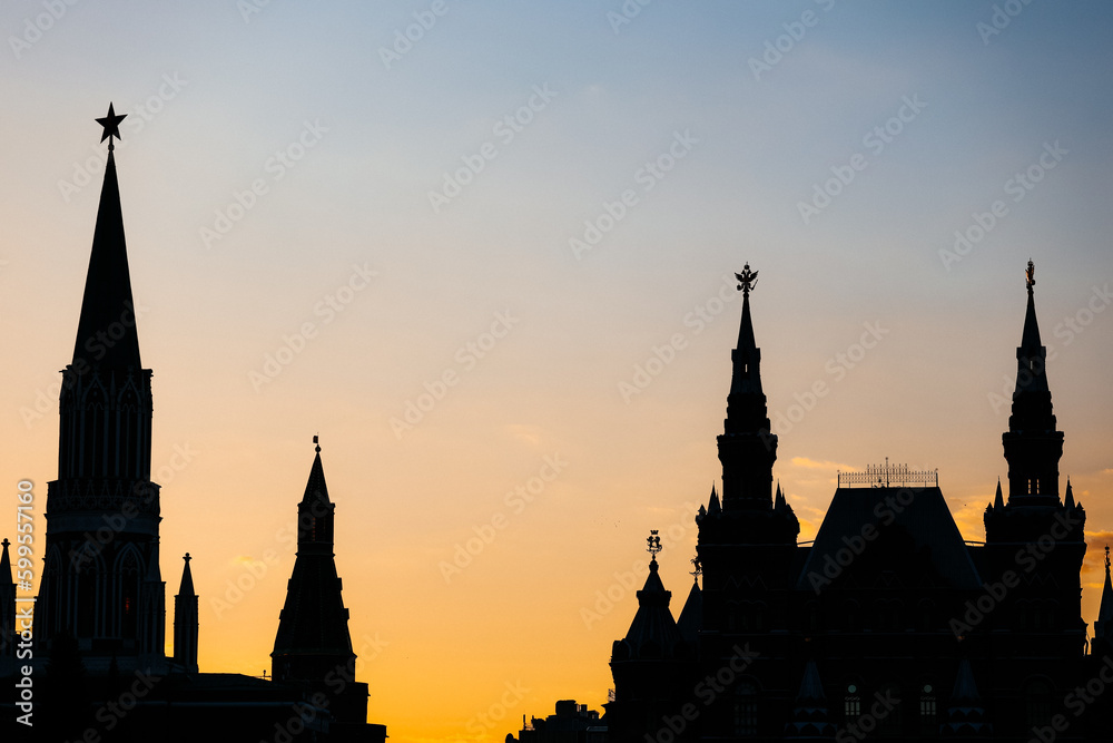 Silhouettes of towers near Moscow Kremlin on sunset