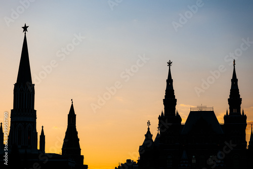 Silhouettes of towers near Moscow Kremlin on sunset