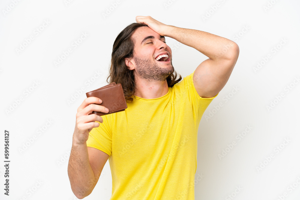 Fototapeta premium Young handsome man holding a wallet isolated on white background has realized something and intending the solution