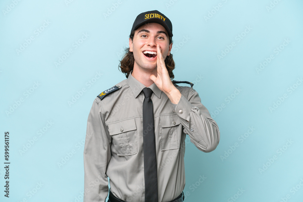 Young safeguard man isolated on blue background with surprise and shocked facial expression Young safeguard man isolated on blue background with surprise and shocked facial expression