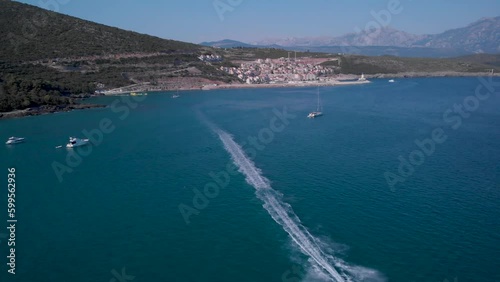Wallpaper Mural Jetskiing In The Blue Sea With Lustica Bay In The Background In Montenegro. - aerial Torontodigital.ca