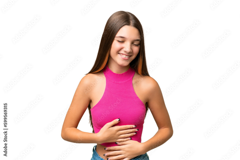 Teenager caucasian girl over isolated background smiling a lot Teenager caucasian girl over isolated background smiling a lot