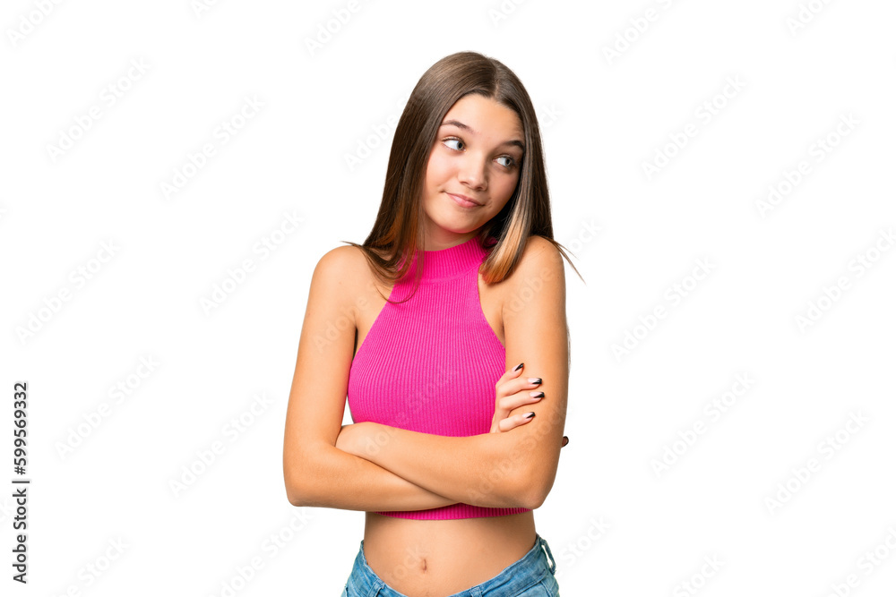 Teenager caucasian girl over isolated background making doubts gesture while lifting the shoulders Teenager caucasian girl over isolated background making doubts gesture while lifting the shoulders