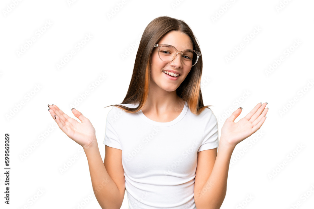 Teenager caucasian girl over isolated background smiling a lot Teenager caucasian girl over isolated background smiling a lot