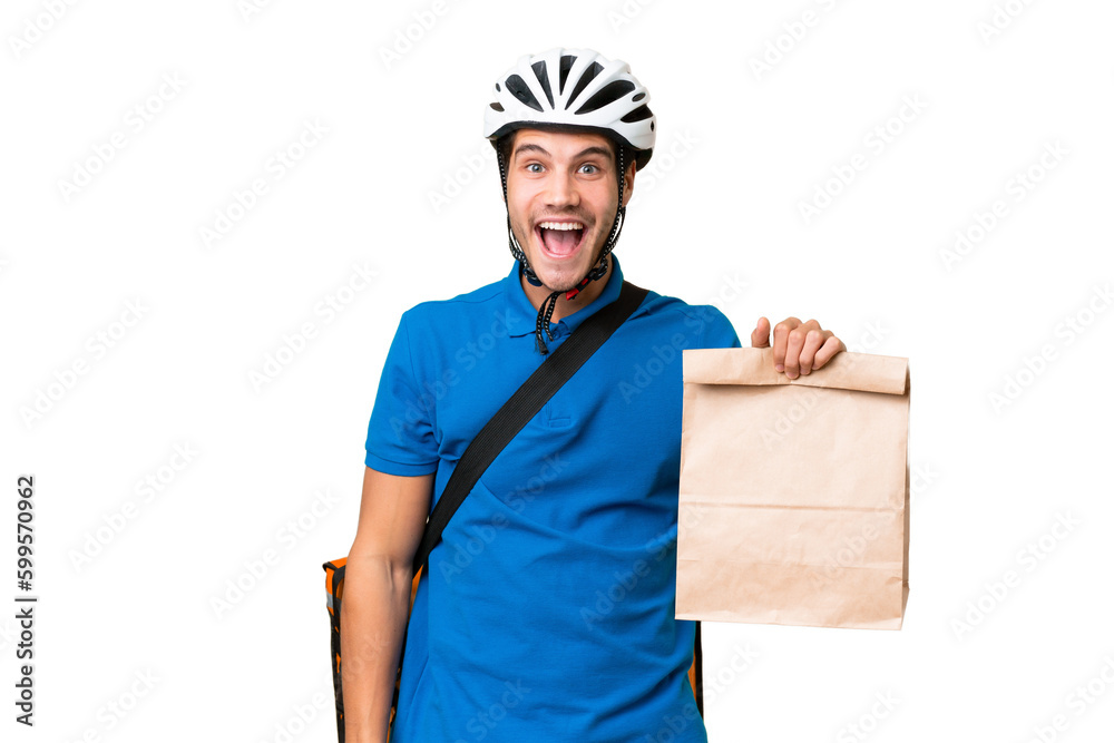 Young caucasian man taking a bag of takeaway food over isolated background with surprise facial expression Young caucasian man taking a bag of takeaway food over isolated background with surprise facial expression