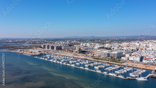 Aerial view of the Portuguese fishing tourist town of Olhao overlooking the Ria Formosa Marine Park. sea port for yachts