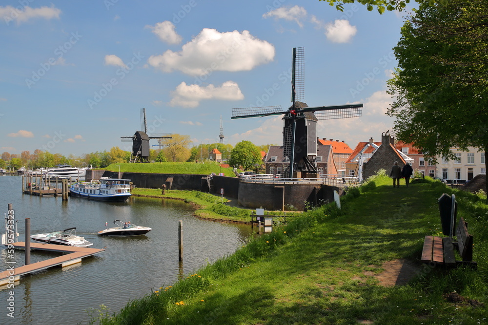 The Harbor of Heusden, North Brabant, Netherlands, a fortified city located 19km far from Hertogenbosch, with windmills and mooring boats