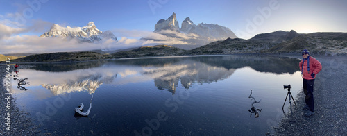 Beautiful panorama mountain view with mist and reflection in lago pehoe lake in Torres del Paine National Park, Patagonia in Chile. It is a popular place for tourist and photographer.
