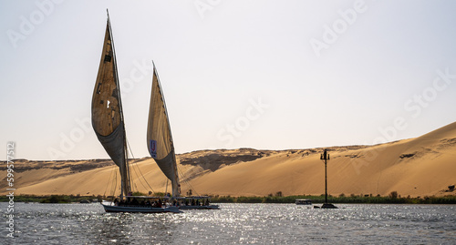 Feluccas sail on the Nile River in Egypt