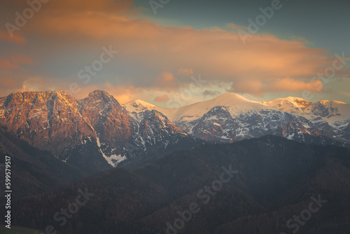 mountain peaks illuminated by the sunset in the Tatras © vadimborkin