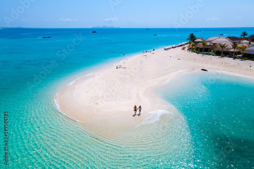 Εκτύπωση καμβά men and women walking on a sandbar in the ocean of Koh lipe Southern Thailand du