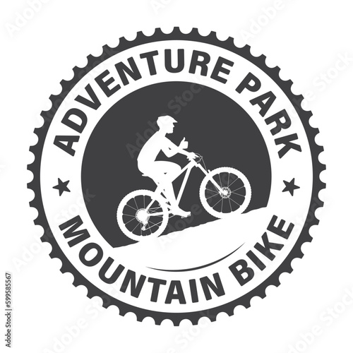 Vector circular logo of a cyclist riding a bike with an inscription: adventure park mountain bike. Isolated on white background.
