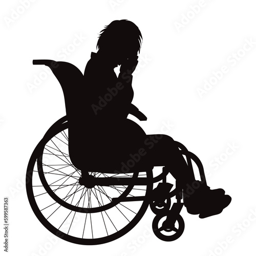 Vector silhouette of a child sitting in a wheelchair on a white background.