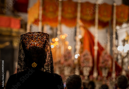 La Semana Santa andaluza es una celebración religiosa que se lleva a cabo durante la semana anterior a la Pascua, con procesiones de imágenes religiosas y música en vivo. photo