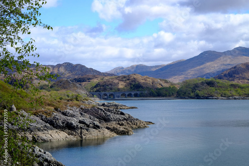 View of the Glenfinnan viaduct and Loch Eilt on the way from Fort William to Mallaig