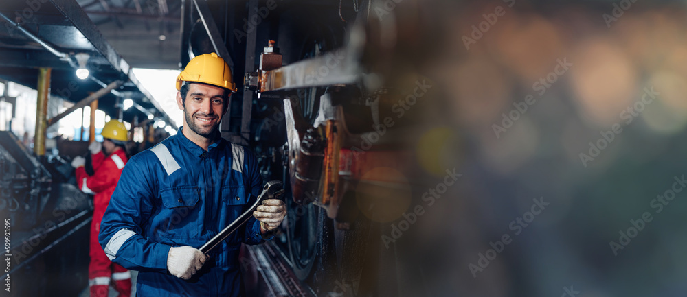 Team of engineer railway wearing safety uniform and helmet under checking under train ,wheels and control system for safety travel passenger. Banner cover design.