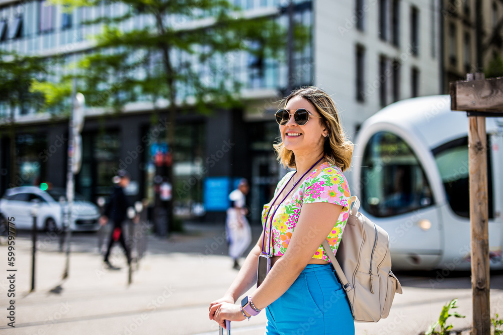 Happy young woman on vacation in Europe