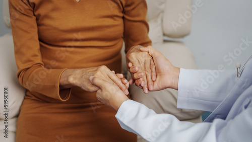 Elderly Asian female patients with cancer specialists meet by appointment to receive treatment advice for breast, cervical, lung cancer.