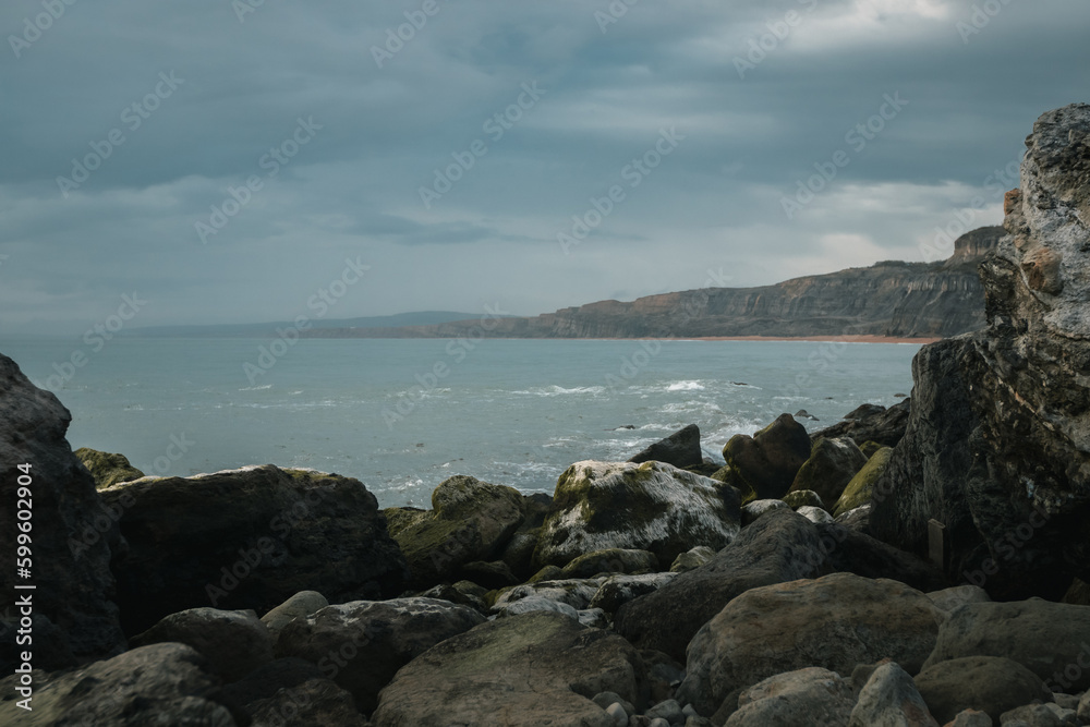 View of a stormy sea from the rocks View of a stormy sea from the rocks
