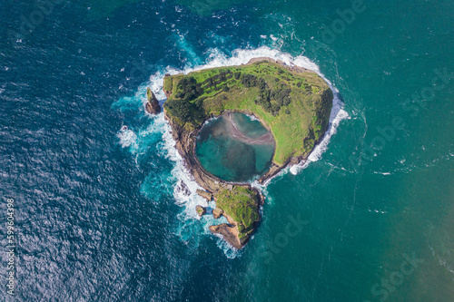 Azores aerial view. Top view of the Island of Vila Franca do Campo. Crater of an old underwater volcano on San Miguel island, Azores, Portugal.